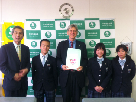 With the principal (left) and students of Kanon junior high school