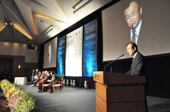 Hiroshima Mayor Akiba making a welcome speech at the opening session