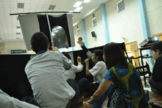 The volunteers performing the puppet show