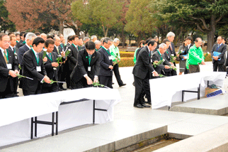 Participants placed flowers at the Cenotaph