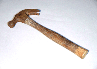 A hammer used in construction work Donated by: Mr. Yuzo Yamamoto