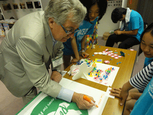 Representative of Malakoff City, France, Mr. Michel Cibot, writes a message