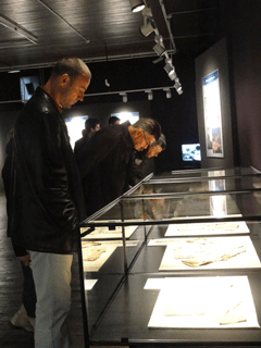 Visitors looking at atomic bombing artifacts (Zagreb City Technical Museum)