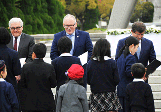 Children reading out peace messages
