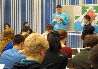 Students from America's Central Connecticut State University reciting poetry at the A-bomb poetry recital session