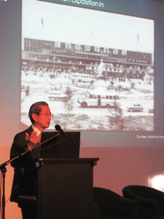 Mr. Komizo giving a presentation