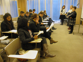 Students from the University of Indianapolis reciting their own A-bomb poetry at the Hiroshima National Peace Memorial Hall for the Atomic Bomb Victims