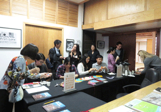 Visitors making origami cranes at the A-bomb exhibition venue
