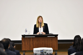 Ms. Fihn speaks to young people during the keynote lecture