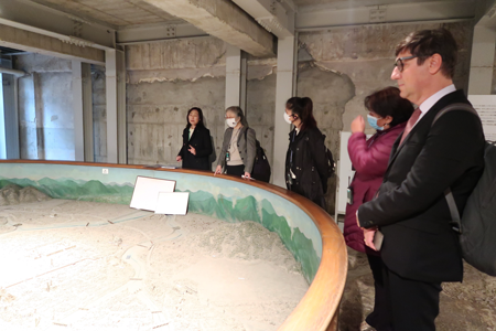 Participants listening to Miho Iwata's explanation at the Honkawa Elementary School Peace Museum