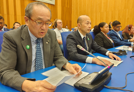 President Matsui delivering his statement