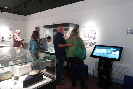 Visitors viewing the exhibit with great interest (Durham City)