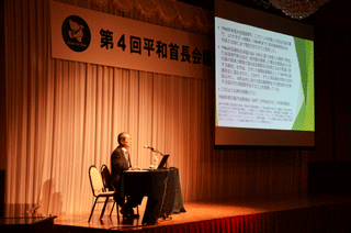 情勢報告を行う小溝広島平和文化センター理事長